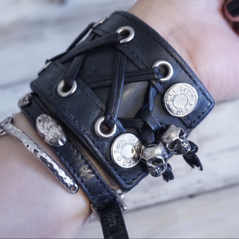 Vegan leather lace cuff with metal skull charms